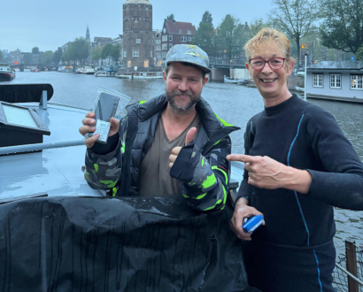 Duiker en eigenaar aan boord in Amsterdam